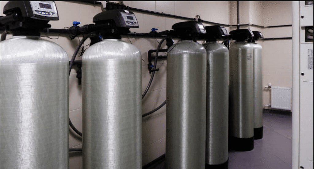 Several portable exchange tanks standing in a row